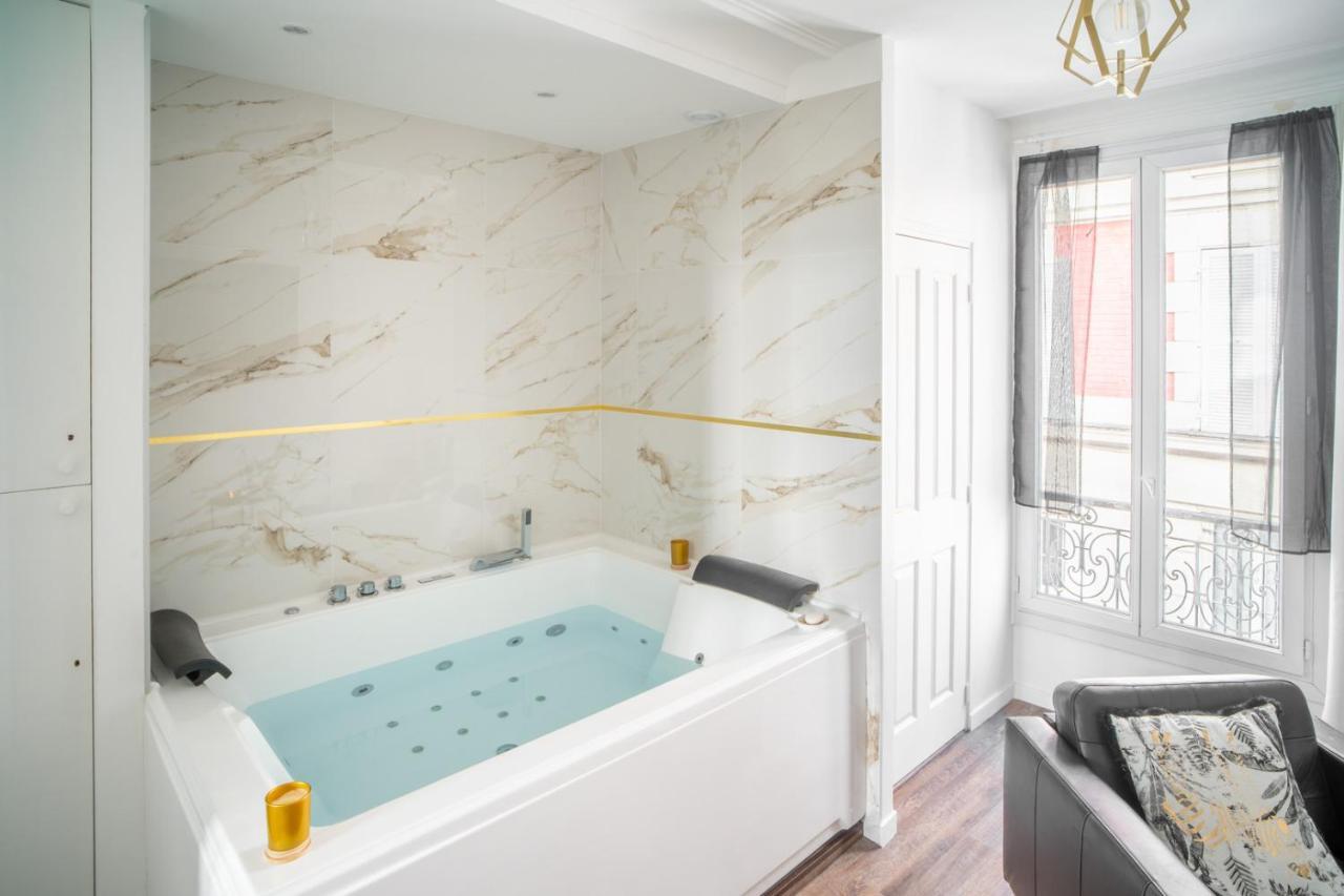 Suite L'éclipse Paris, logement avec jacuzzi, à 10 minutes des Champs Elysées Levallois-Perret Esterno foto